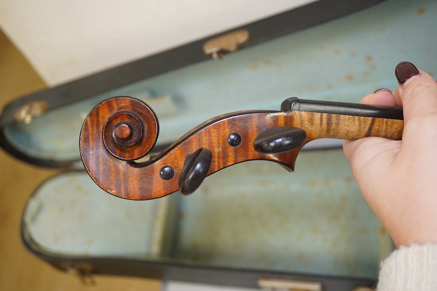 A late 19th century French Chipot-Vuillaume violin, with Edward Withers case, back measures 36cm.